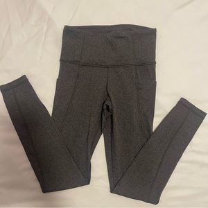 Athleta grey stash pocket salutation tight